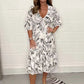 Zomeruitverkoop 49% korting🔥Elegante V-hals jurk met botanische print