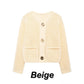 Gebreid damesvest met uitsnijdingen