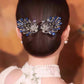 Koop 1 krijg 1 gratis--Elegante Engelvleugel Pauwenontwerp Updo-maker